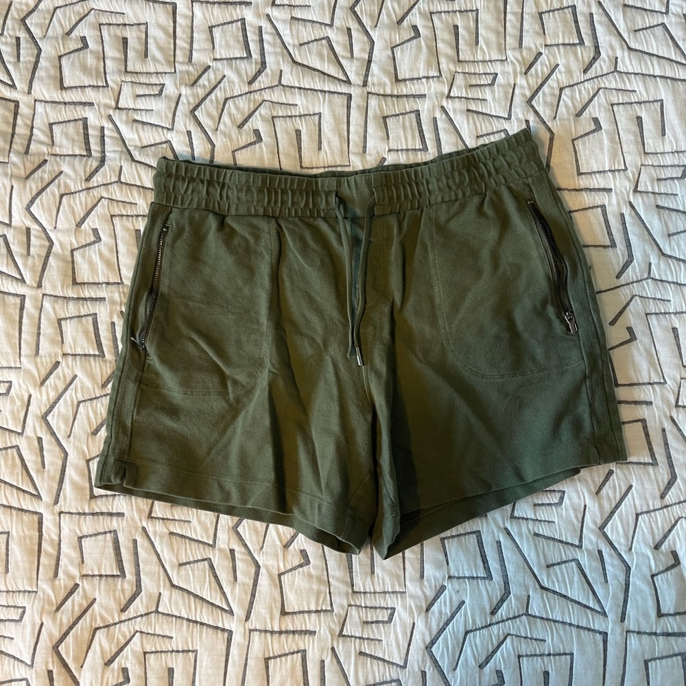 Green athletic shorts